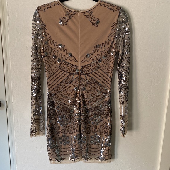 NWT. Short sequin dress. Nude lining and sheer arms. Long sleeve. XS. - Picture 3 of 3